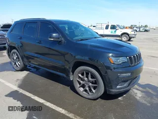 2019 Jeep Grand Cherokee Limited with VIN 1C4RJFBGXKC842475, listed as a IAAI auction lot 42168503 with 101,974 mi miles and . Bid and sale history available at DreamBid. Image 1.