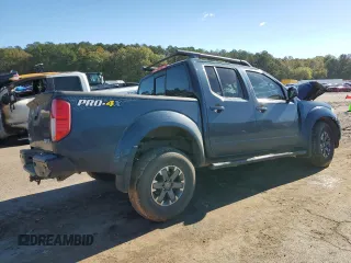 2016 Nissan Frontier Pro-4X z VIN 1N6AD0EV6GN799371, wystawiony jako Copart lot #81292914 z przebiegiem Nie podano mil oraz Szkoda całkowita • Salvage title. Historia ofert i sprzedaży dostępna na DreamBid. Obrazek 3.
