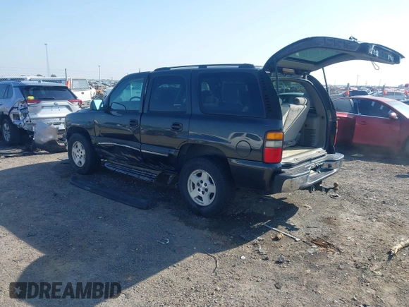 2004 Chevrolet Tahoe LS with VIN 1GNEC13V04R178784, listed as a IAAI auction lot 42013755 with 126,162 mi miles. Bid and sale history available at carsss.com. Image 3.
