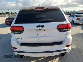 2018 Jeep Grand Cherokee Overland z VIN 1C4RJFCT1JC502125, wystawiony jako Copart lot #61613274 z przebiegiem 59 692 mil mil oraz Nie do naprawy • Non repairable. Historia ofert i sprzedaży dostępna na DreamBid. Obrazek 6.