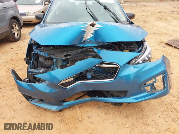 2019 Subaru Impreza with VIN 4S3GTAA64K3718084, listed as a IAAI auction lot 41726910 with 56,523 mi miles and . Bid and sale history available at DreamBid. Image 6.