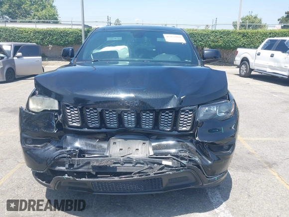 2018 Jeep Grand Cherokee Altitude with VIN 1C4RJEAG2JC428536, listed as a IAAI auction lot 42472960 with 74,631 mi miles and . Bid and sale history available at DreamBid. Image 12.