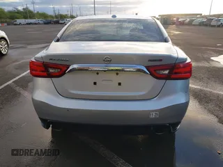 2016 Nissan Maxima S z VIN 1N4AA6AP1GC411633, wystawiony jako IAAI lot #41559508 z przebiegiem 95 240 mil mil oraz . Historia ofert i sprzedaży dostępna na DreamBid. Obrazek 16.