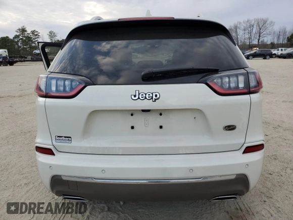 2019 Jeep Cherokee with VIN 1C4PJLJX3KD381640, listed as a Copart auction lot 42463593 with 28,310 mi miles and . Bid and sale history available at DreamBid. Image 6.