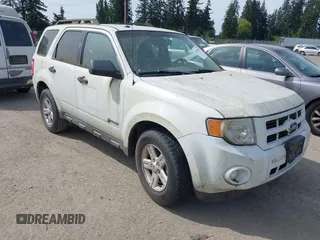 2010 Ford Escape Hybrid with VIN 1FMCU4K35AKC14385, listed as a IAAI auction lot 42182581 with 115,974 mi miles and . Bid and sale history available at DreamBid. Image 1.