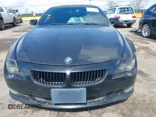 2009 BMW 6 Series 650i z VIN WBAEB53539CX64230, wystawiony jako IAAI lot #41827275 z przebiegiem 108 260 mil mil oraz . Historia ofert i sprzedaży dostępna na DreamBid. Obrazek 6.