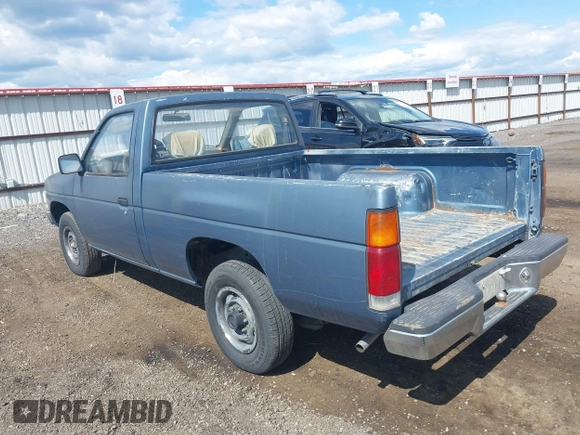 1989 Nissan Hardbody z VIN 1N6ND11S7KC338798, wystawiony jako IAAI lot #42328305 z przebiegiem 153 347 mil mil oraz . Historia ofert i sprzedaży dostępna na DreamBid. Obrazek 3.
