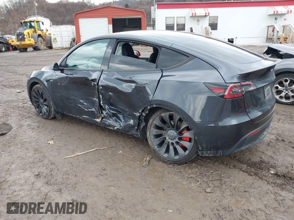 2024 Tesla Model Y Performance with VIN 7SAYGDEF7RF020203, listed as a IAAI auction lot 41639077 with 14,493 mi miles and . Bid and sale history available at DreamBid. Image 3.