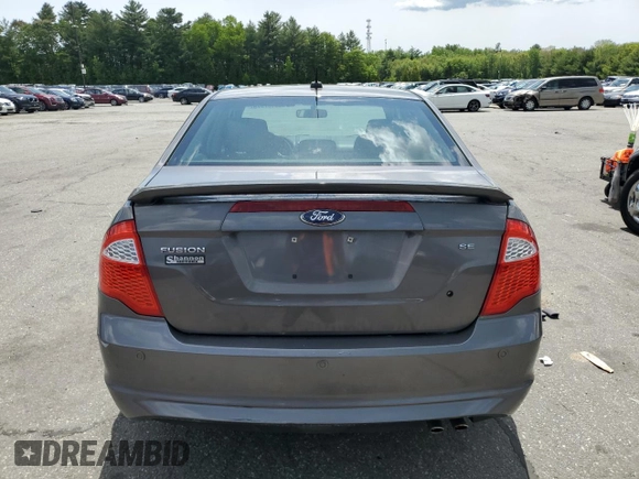 2012 Ford Fusion SE z VIN 3FAHP0HA6CR183815, wystawiony jako Copart lot #58187975 z przebiegiem 118 101 mil mil oraz Szkoda całkowita • Salvage title. Historia ofert i sprzedaży dostępna na DreamBid. Obrazek 6.