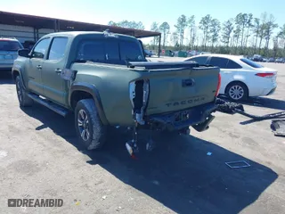 2016 Toyota Tacoma SR with VIN 3TMCZ5ANXGM038420, listed as a IAAI auction lot 41635372 with 113,723 mi miles. Bid and sale history available at carsss.com. Image 3.