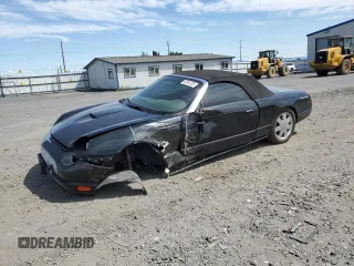 2002 Ford Thunderbird Hardtop Premium z VIN 1FAHP60A92Y117614, wystawiony jako Copart lot #59344735 z przebiegiem 83 723 mil mil oraz Szkoda całkowita • Salvage title. Historia ofert i sprzedaży dostępna na DreamBid. Obrazek 1.
