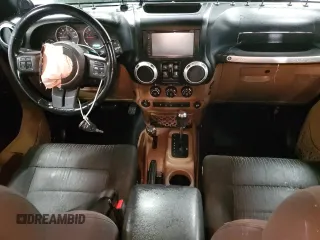 2011 Jeep Wrangler Unlimited Sahara with VIN 1J4BA5H17BL592752, listed as a Copart auction lot 83344334 with 176,259 mi miles and Clean Title. Bid and sale history available at carsss.com. Image 8.