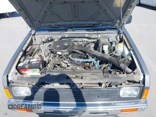 1988 Nissan Hardbody z VIN 1N6ND11S0JC345025, wystawiony jako IAAI lot #41899460 z przebiegiem 132 502 mil mil oraz . Historia ofert i sprzedaży dostępna na DreamBid. Obrazek 10.