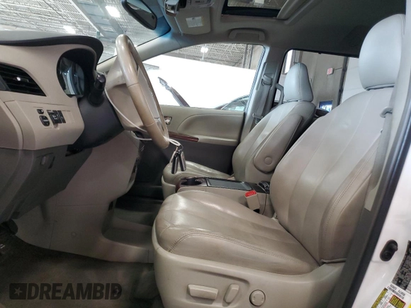 2013 Toyota Sienna XLE with VIN 5TDDK3DC9DS070424, listed as a Copart auction lot 61406715 with 193,583 mi miles and Salvage title. Bid and sale history available at DreamBid. Image 7.
