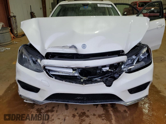 2014 Mercedes-Benz E 400 Sport with VIN WDDHF9FBXEA936424, listed as a Copart auction lot 83331224 with 194,689 mi miles and Salvage Title. Bid and sale history available at DreamBid. Image 12.