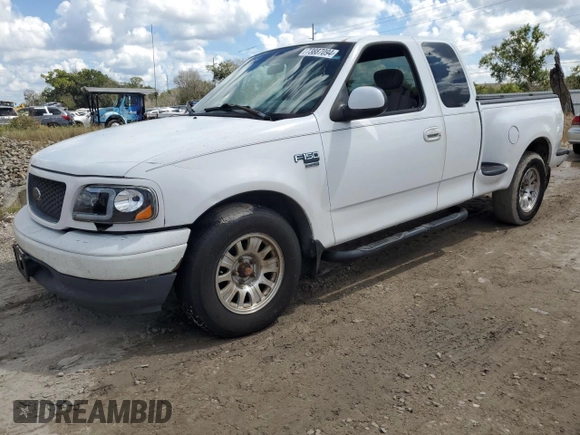 2001 Ford F-150 XL with VIN 1FTRX07L81KF40897, listed as a Copart auction lot 73887094 with 0 mi miles and Salvage Title. Bid and sale history available at carsss.com. Image 1.