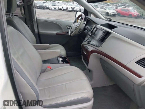2014 Toyota Sienna Limited with VIN 5TDDK3DC4ES081882, listed as a IAAI auction lot 42270167 with 58,723 mi miles and . Bid and sale history available at DreamBid. Image 5.