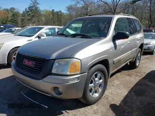 2002 GMC Envoy SLT with VIN 1GKDS13S622158143, listed as a IAAI auction lot 41886178 with 217,310 mi miles. Bid and sale history available at carsss.com. Image 2.