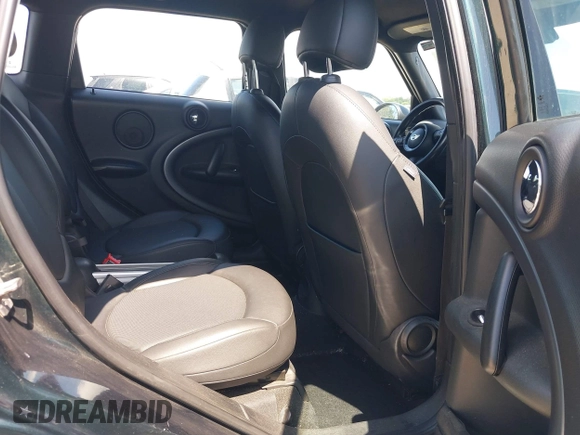 2011 MINI Countryman S with VIN WMWZC5C53BWM10484, listed as a IAAI auction lot 42250690 with 113,534 mi miles and . Bid and sale history available at DreamBid. Image 8.