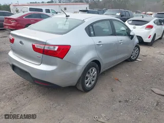 2013 Kia Rio LX with VIN KNADM4A37D6128158, listed as a IAAI auction lot 41712676 with 154,478 mi miles. Bid and sale history available at carsss.com. Image 4.