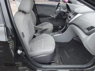 2014 Hyundai Accent GS with VIN KMHCT5AE9EU197712, listed as a IAAI auction lot 41493618 with 83,890 mi miles. Bid and sale history available at carsss.com. Image 5.