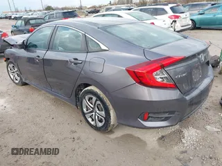 2016 Honda Civic Sedan LX with VIN 19XFC2F52GE009350, listed as a IAAI auction lot 41907696 with 141,306 mi miles. Bid and sale history available at carsss.com. Image 3.