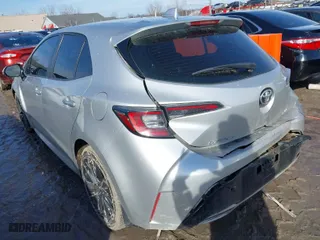 2019 Toyota Corolla Hatchback SE with VIN JTNK4RBE8K3066254, listed as a IAAI auction lot 41668885 with 57,885 mi miles. Bid and sale history available at carsss.com. Image 3.