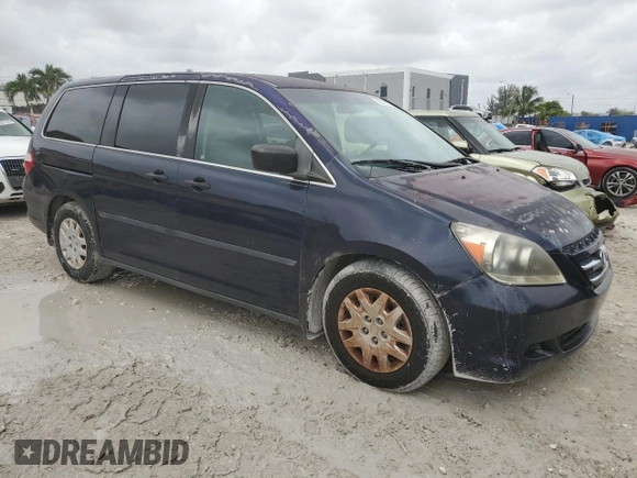 2007 Honda Odyssey LX with VIN 5FNRL382X7B054326, listed as a Copart auction lot 58912205 with 168,994 mi miles and Clean title. Bid and sale history available at DreamBid. Image 4.