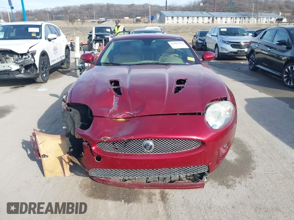 2008 Jaguar XK with VIN SAJWA43C089B22700, listed as a IAAI auction lot 41585734 with 67,946 mi miles. Bid and sale history available at carsss.com. Image 12.