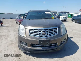 2015 Cadillac SRX Performance Collection with VIN 3GYFNCE31FS598109, listed as a IAAI auction lot 41788267 with 172,488 mi miles and . Bid and sale history available at DreamBid. Image 12.