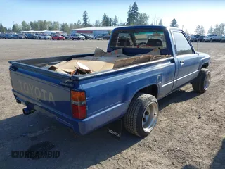 1987 Toyota Pickup with VIN JT4RN50RXH0283460, listed as a IAAI auction lot 42086809 with 183,562 mi miles and . Bid and sale history available at DreamBid. Image 4.