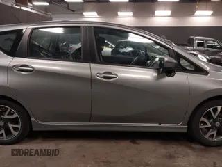2015 Nissan Note SV with VIN 3N1CE2CP0FL400447, listed as a IAAI auction lot 41669498 with 96,699 mi miles and . Bid and sale history available at DreamBid. Image 14.