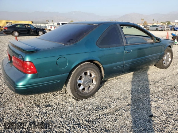 1997 Ford Thunderbird LX z VIN 1FALP62W4VH170423, wystawiony jako Copart lot #83379614 z przebiegiem 93 117 mil mil oraz Szkody całkowita. Historia ofert i sprzedaży dostępna na DreamBid. Obrazek 3.