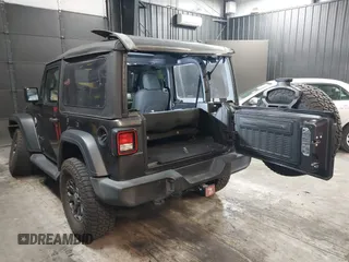 2021 Jeep Wrangler Sport S with VIN 1C4HJXAG2MW502452, listed as a IAAI auction lot 42031159 with 87,952 mi miles and . Bid and sale history available at DreamBid. Image 3.