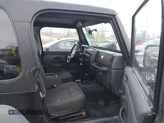 2006 Jeep Wrangler Sport with VIN 1J4FA49S66P746787, listed as a IAAI auction lot 41537730 with 97,365 mi miles. Bid and sale history available at carsss.com. Image 5.