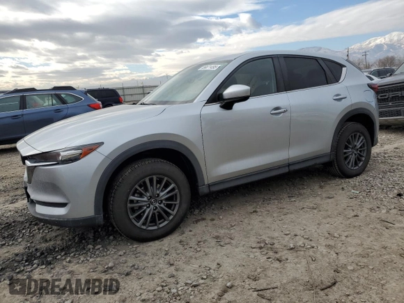 2021 Mazda CX-5 Touring with VIN JM3KFACM9M0409414, listed as a Copart auction lot 89071495 with 43,896 mi miles and Salvage Title. Bid and sale history available at carsss.com. Image 1.