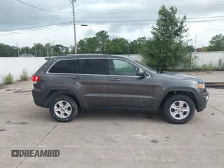 2017 Jeep Grand Cherokee Laredo with VIN 1C4RJFAG1HC604461, listed as a IAAI auction lot 42685509 with 143,462 mi miles and . Bid and sale history available at DreamBid. Image 13.