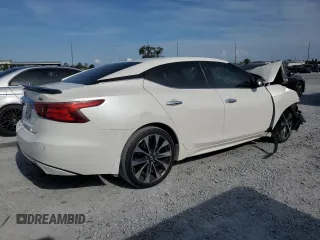 2016 Nissan Maxima SR with VIN 1N4AA6AP5GC421677, listed as a Copart auction lot 58738515 with 140,920 mi miles and Salvage title. Bid and sale history available at DreamBid. Image 3.