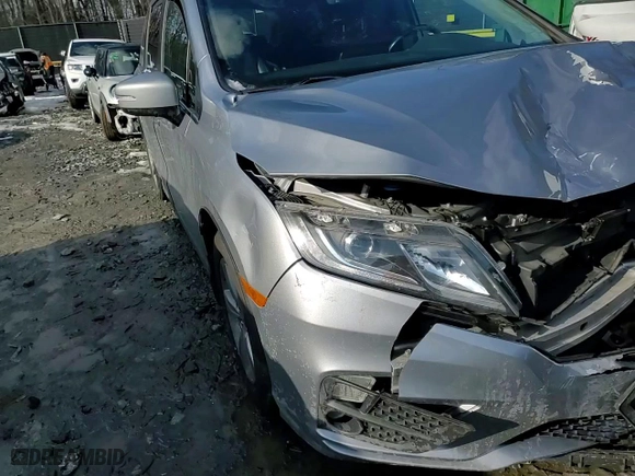 2019 Honda Odyssey EX-L with VIN 5FNRL6H75KB017819, listed as a Copart auction lot 87477044 with 81,061 mi miles and Salvage Title. Bid and sale history available at carsss.com. Image 12.