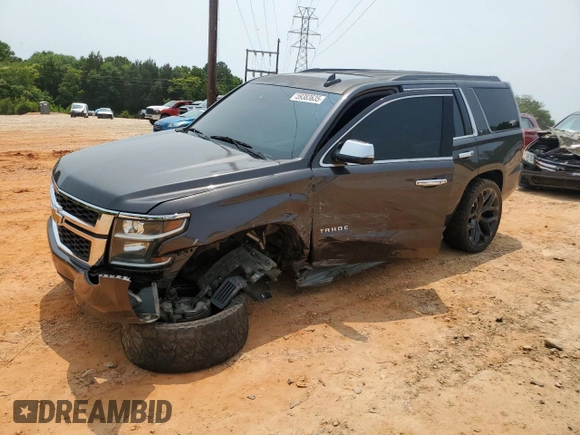 2015 Chevrolet Tahoe LT with VIN 1GNSCBKC0FR640692, listed as a Copart auction lot 59383635 with Not provided miles and Salvage title. Bid and sale history available at DreamBid. Image 1.