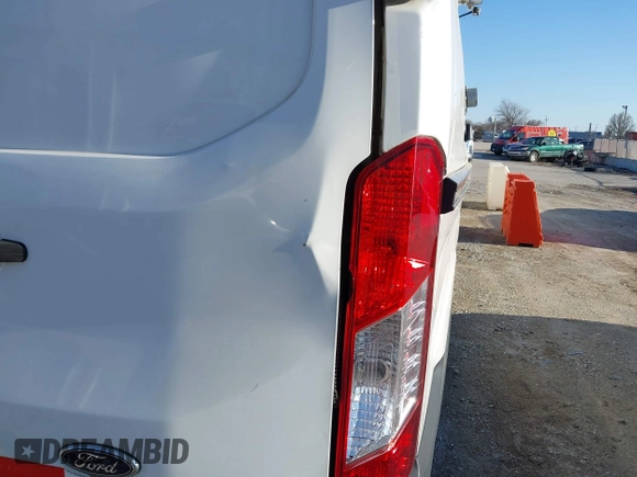 2016 Ford Transit Cargo with VIN 1FTYR1YM9GKB55554, listed as a IAAI auction lot 41850417 with 69,562 mi miles and . Bid and sale history available at DreamBid. Image 18.