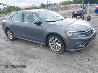 2018 Volkswagen Passat SE z VIN 1VWBA7A35JC011922, wystawiony jako IAAI lot #42293413 z przebiegiem 131 331 mil mil oraz . Historia ofert i sprzedaży dostępna na DreamBid. Obrazek 1.