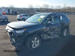2020 Toyota RAV4 XLE with VIN 2T3P1RFV2LW130185, listed as a IAAI auction lot 42033372 with 98,667 mi miles and . Bid and sale history available at DreamBid. Image 2.