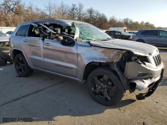 2015 Jeep Grand Cherokee Altitude with VIN 1C4RJFAG0FC136039, listed as a Copart auction lot 89237525 with 124,374 mi miles and Salvage Title. Bid and sale history available at carsss.com. Image 4.
