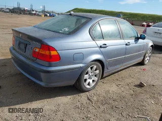 2004 BMW 3 Series 325i with VIN WBAAZ33434KP83350, listed as a IAAI auction lot 41993657 with 123,867 mi miles. Bid and sale history available at carsss.com. Image 4.