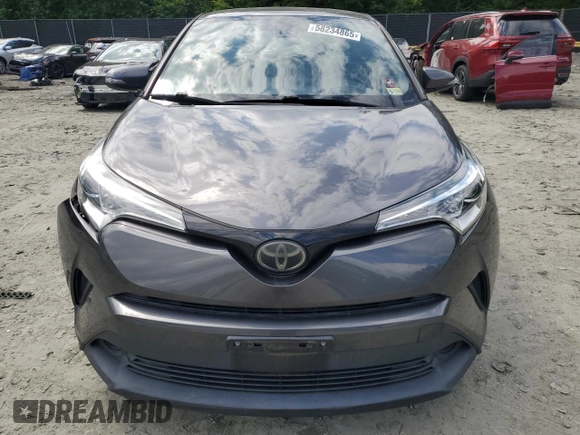 2018 Toyota C-HR XLE z VIN JTNKHMBX2J1003394, wystawiony jako Copart lot #58234865 z przebiegiem 132 574 mil mil oraz Szkoda całkowita • Salvage title. Historia ofert i sprzedaży dostępna na DreamBid. Obrazek 5.