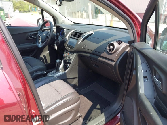 2016 Chevrolet Trax LT z VIN 3GNCJLSB9GL152213, wystawiony jako IAAI lot #42264657 z przebiegiem 126 710 mil mil oraz . Historia ofert i sprzedaży dostępna na DreamBid. Obrazek 5.