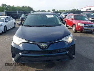2017 Toyota RAV4 LE with VIN JTMZFREV4HJ136104, listed as a IAAI auction lot 42077699 with 120,360 mi miles and . Bid and sale history available at carsss.com. Image 12.