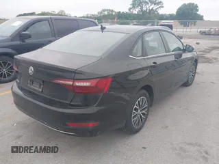 2021 Volkswagen Jetta S z VIN 3VWC57BU5MM008733, wystawiony jako IAAI lot #42527371 z przebiegiem 76 548 mil mil oraz . Historia ofert i sprzedaży dostępna na DreamBid. Obrazek 4.