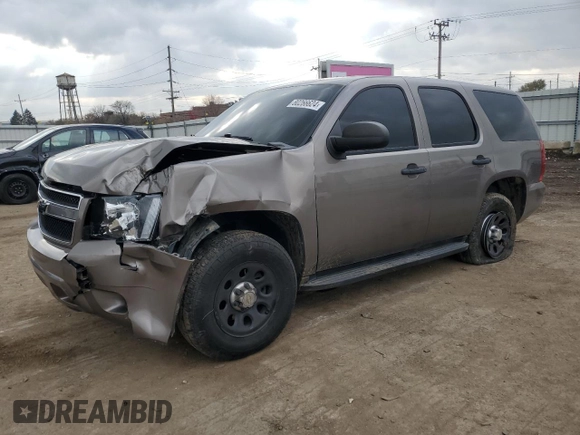 2012 Chevrolet Tahoe Commercial with VIN 1GNSK2E07CR324903, listed as a Copart auction lot 80266624 with 131,700 mi miles and Salvage title. Bid and sale history available at DreamBid. Image 1.